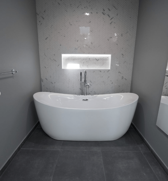 Freestanding tub in modern master bathroom